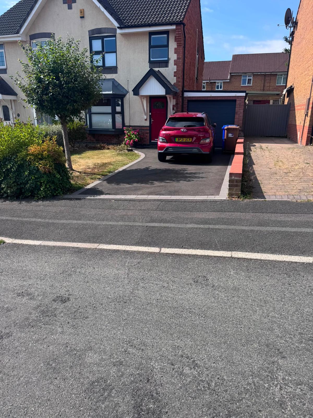 Tarmac driveway and fencing in Chell, Stoke-on-Trent - before